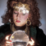 Mystic Woman Looking Into A Crystal Ball
