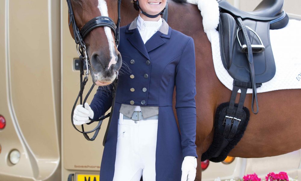 Rider smiling with horse at championships