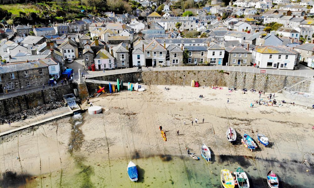 A sunny fishing port in the pretty Cornish village of Mousehole.