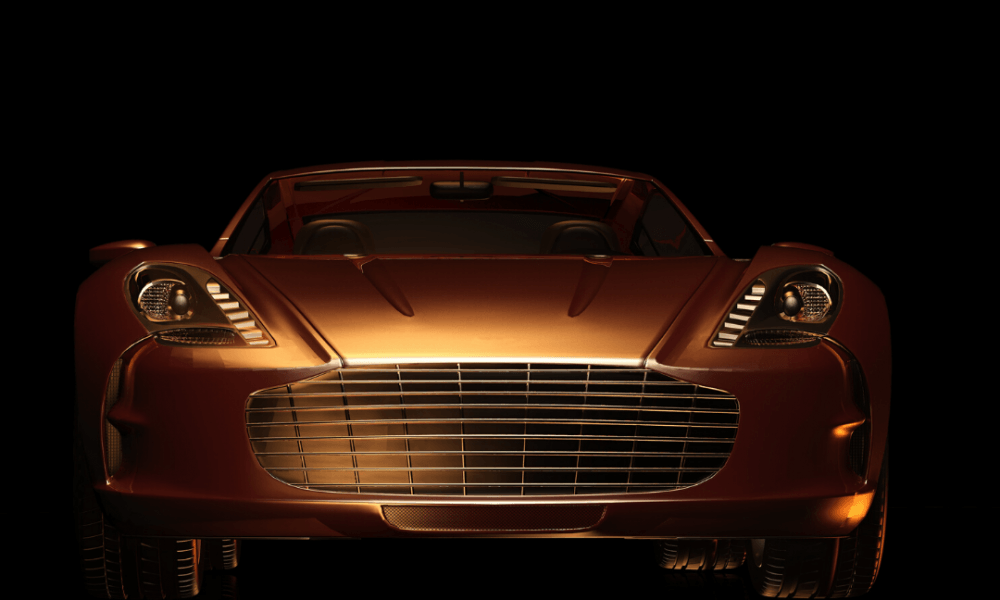 A gold Aston Martin car