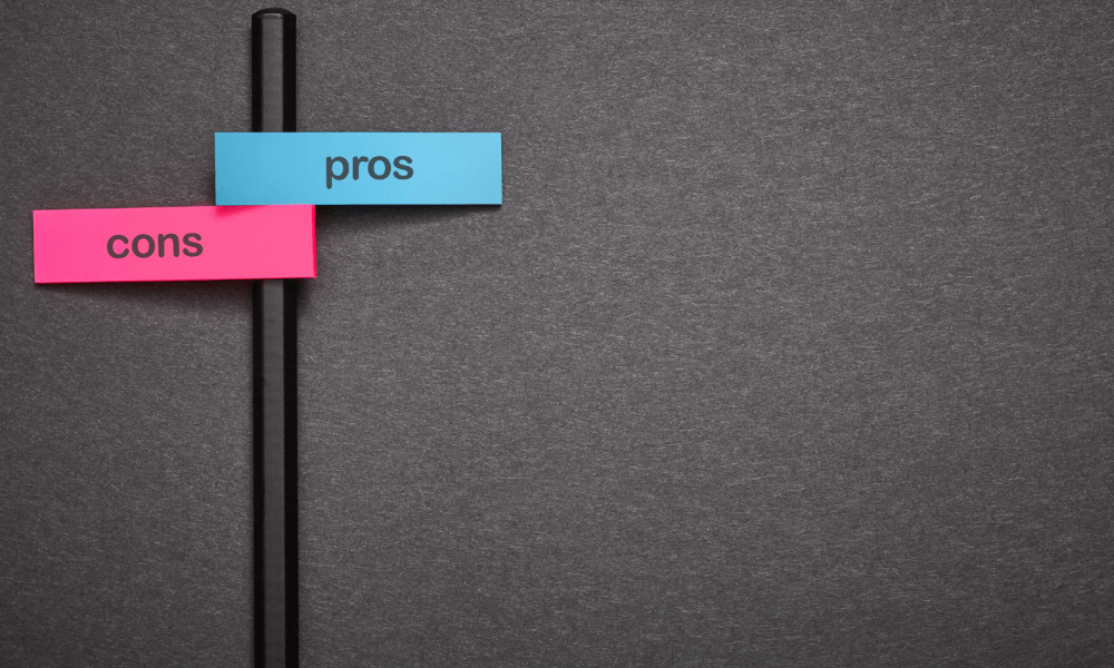Pros and Cons pink and blue sticky notes