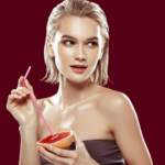 Young Woman With Great Skin Holding Anti-Aging Food