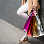 consumer trends woman carrying shopping bags